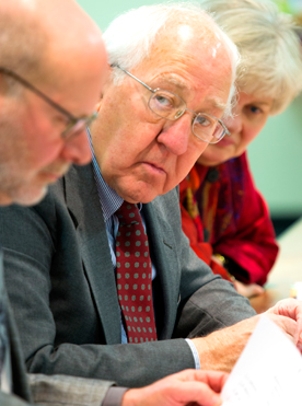 Board members participate in board meeting