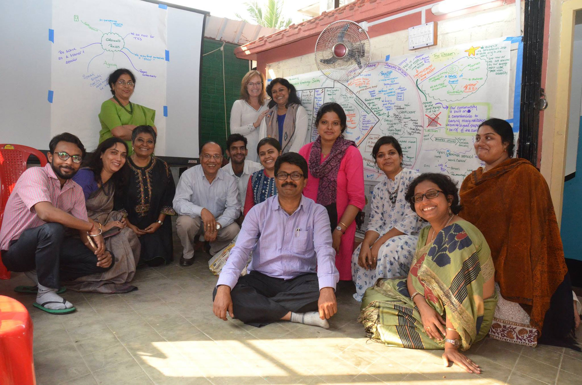 Group photo of people smiling for the camera