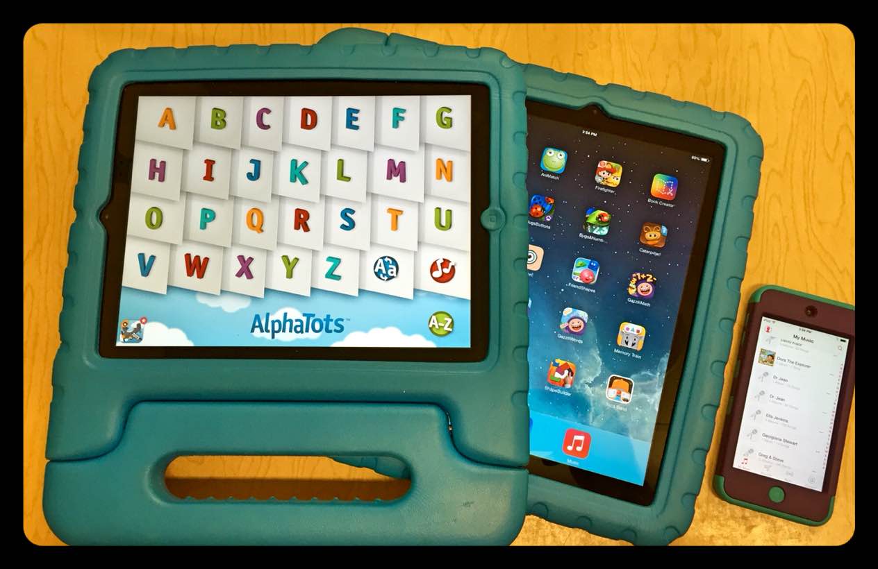 Two tablets and a mobile phone with learning games displayed on their screens