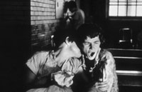 Two people in day room in institution