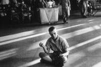 Young boy sitting on floor in day room