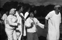 Four people who live in an institution wearing costumes